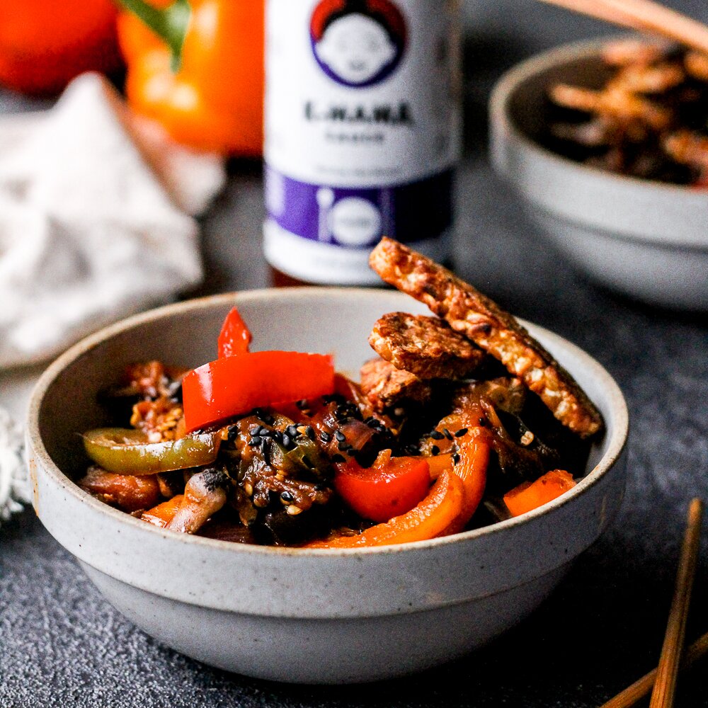 This Korean-inspired stir fry is full of flavor, vegetables, and protein. Simply cook up the vegetables and tempeh while the noodles boil, then toss everything together with the spicy Korean sauce. Quick and easy meal on the table in 30 minutes!